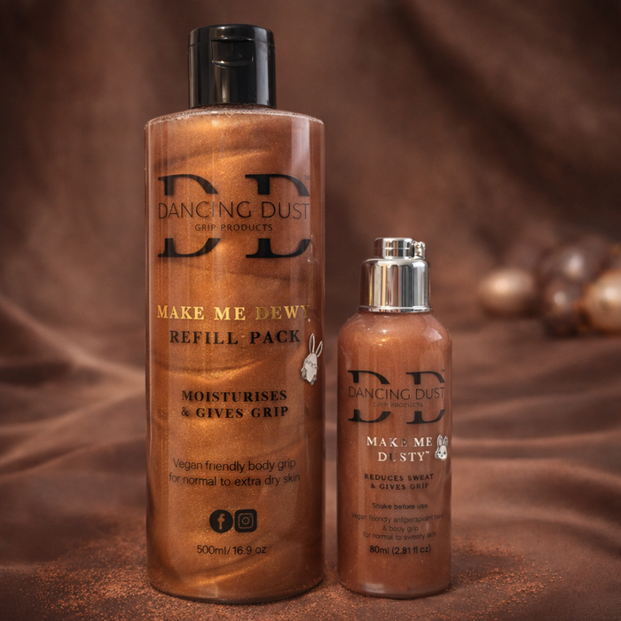 Two bottles of 'Dancing Dust' grip products on a brown background